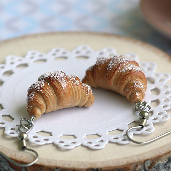 products/croissant_earrings_3-4_crop.jpg
