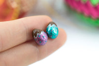 PolinaCreations Handmade Metallic Aqua & Pink Color Easter Chocolate Egg Stud Earrings. Chocolate Egg earrings. Easter earrings. Cute Easter egg earrings polina creations fake food jewelry mini food earrings Easter jewelry holiday jewelry asymmetrical earrings foil egg jewelry 