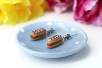 PolinaCreations Handmade jewelry Stuffed pink Eclair Stud Earrings with chocolate stripes Eclair earrings polina creations fake food jewelry miniature food jewelry mini food earrings cute earrings cute jewelry dessert jewelry hypoallergenic earrings pink earrings pink jewelry chocolate jewelry chocolate earrings gift for her gift for girl woman pastry earrings pastry charm pastry jewelry food charm pink eclair earrings pink glaze with chocolate stripes