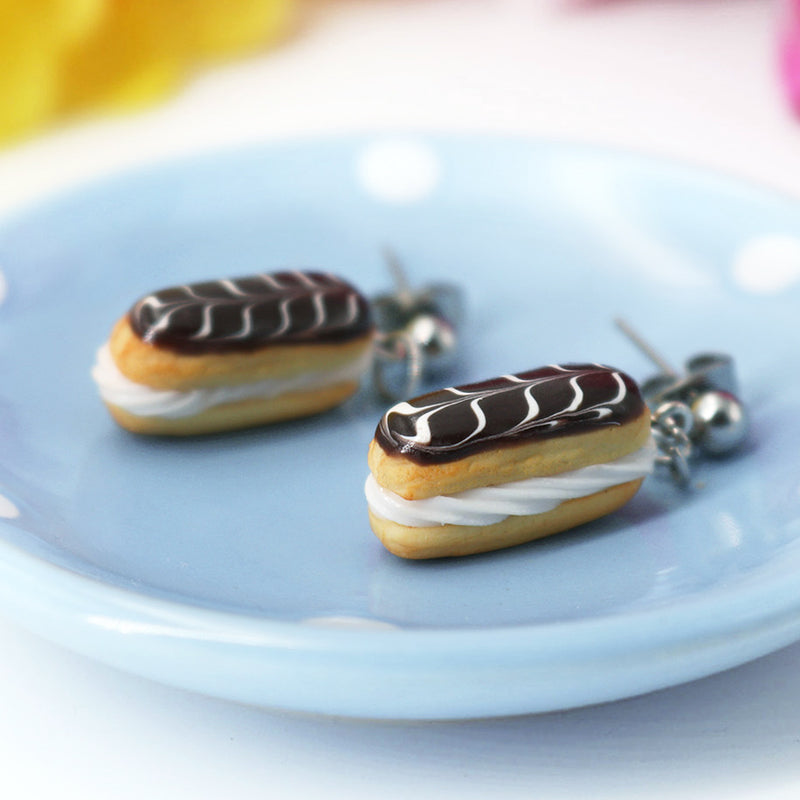 products/handmade_polymer_clay_stuffed_eclair_stud_earrings_with_whipped_cream_1_crop_c899080c-4373-4ae5-87ed-b45e7463a8df.jpg